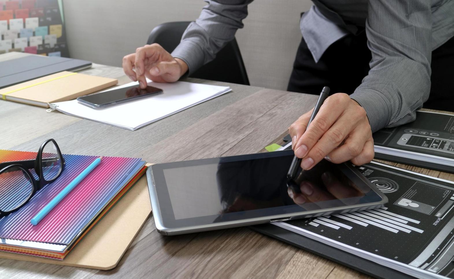 Students working collaboratively on search optimization projects in modern learning environment