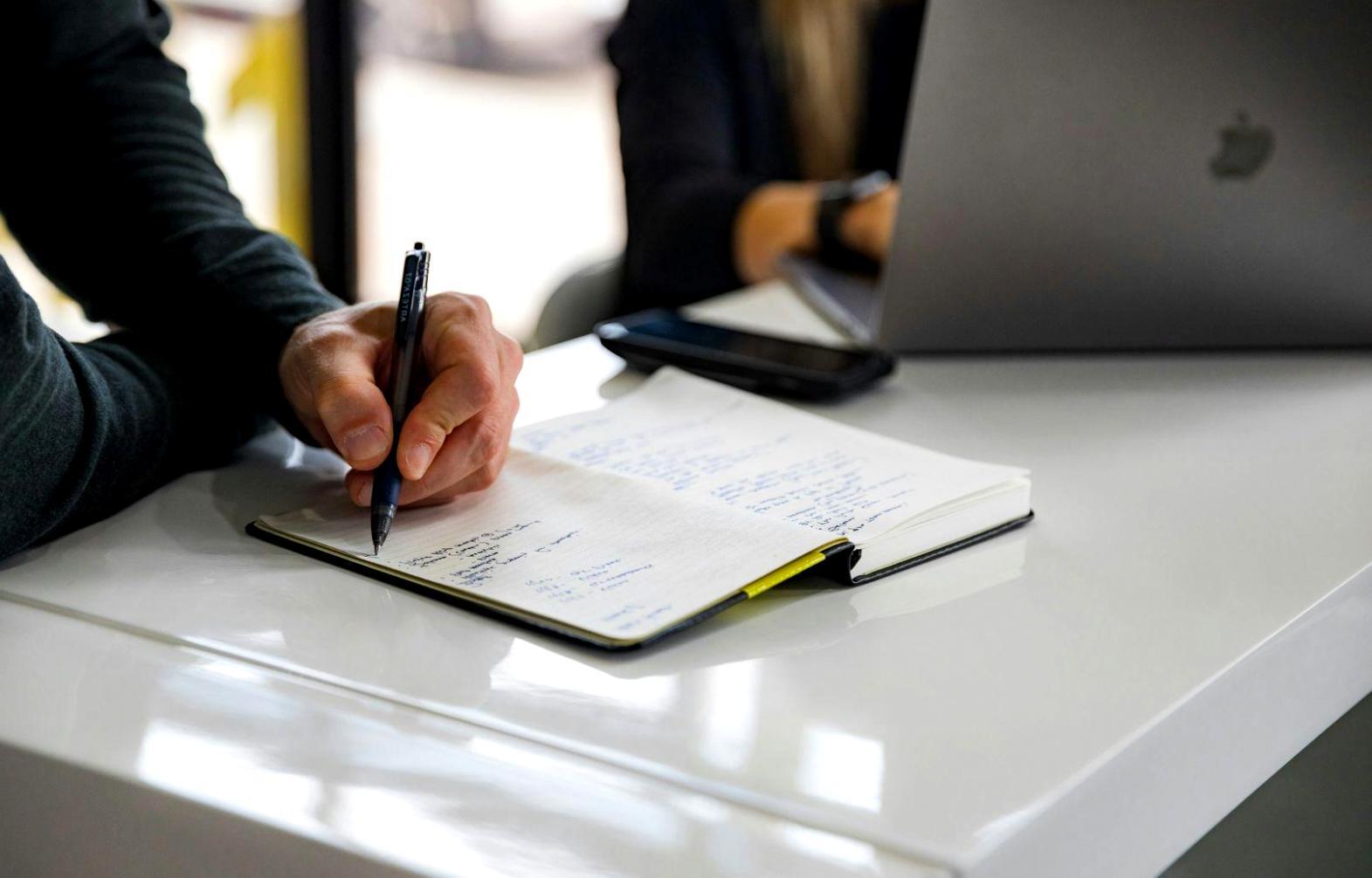 Modern classroom setup with computers and screens displaying search engine optimization tools and analytics dashboards